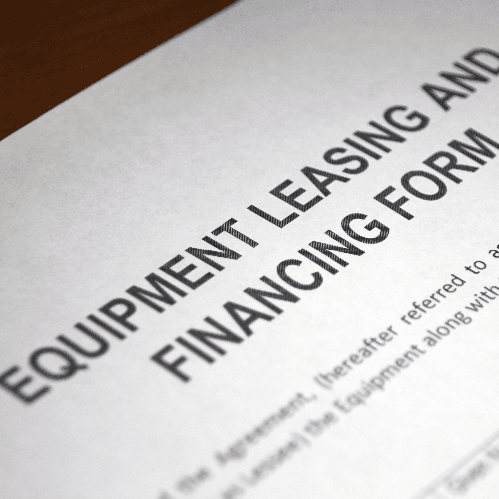 A close up of the words equipment leasing and financing form